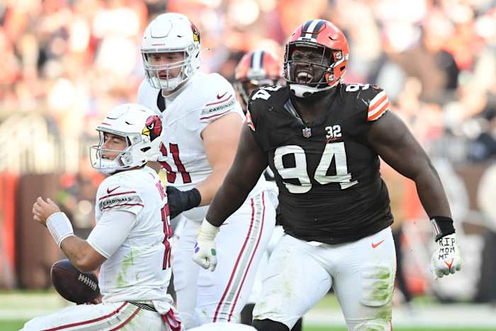 Nov 5, 2023; Cleveland, Ohio, USA; Cleveland Browns defensive tackle Dalvin Tomlinson (94) celebrates after sacking Arizona Cardinals quarterback Clayton Tune (15) during the second half at Cleveland Browns Stadium. Mandatory Credit: Ken Blaze-USA TODAY Sports